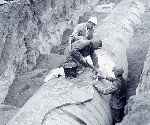 People installing the insulated ribbon cable in Denver