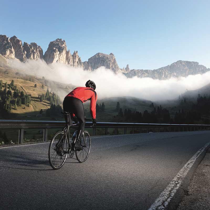 Person biking on a road